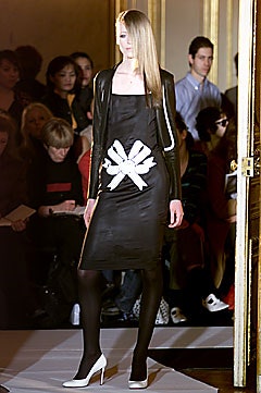 black leather long-sleeve collared tailored zippered jacket