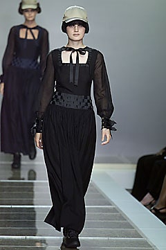 black silk long-sleeve dress with beige hat