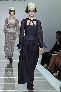 navy silk long-sleeve dress with beige hat