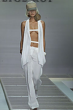 white silk fitted top and relaxed pants