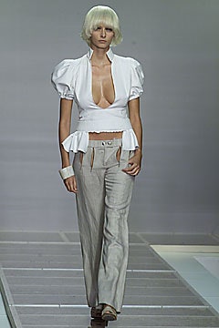 white fitted top with beige pants