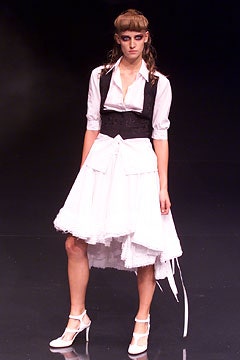 white shirt black vest mini skirt