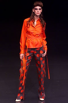 orange fitted shirt with polka-dot pants