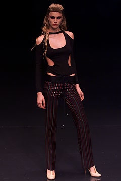 black cutout top with striped pants