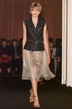 black silk top beige pleated skirt