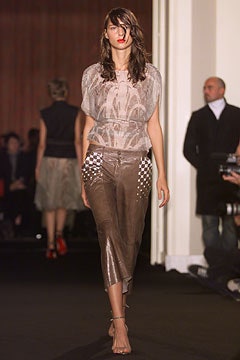 beige silk fitted top and brown leather skirt