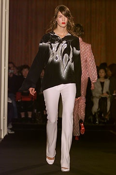 black and white printed top with fitted pants