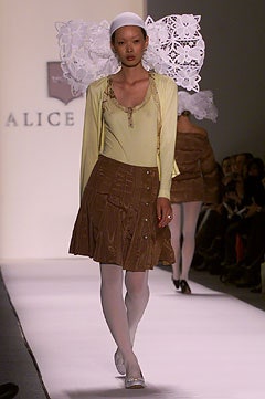 yellow fitted top with brown skirt