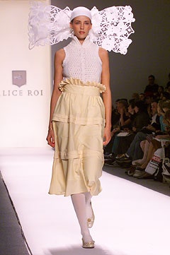 white embroidered top and beige tiered skirt