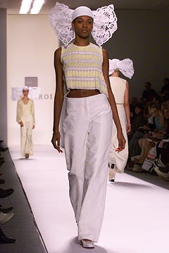 yellow striped cropped top and white wide-leg pants