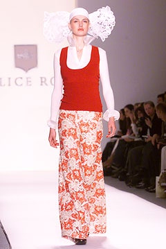 red sleeveless top with flared pants