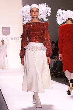 red silk fitted blouse and white tiered skirt