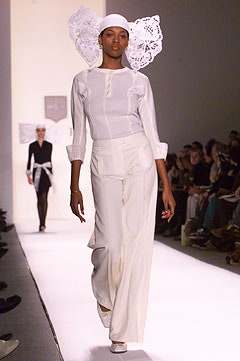 white fitted blouse and relaxed pants