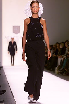 black fitted halter top with tailored pants