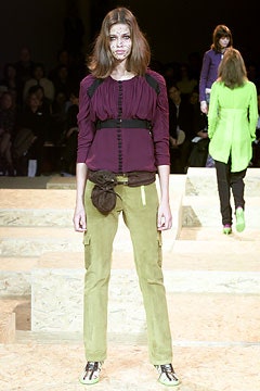 fitted purple top and relaxed green pants