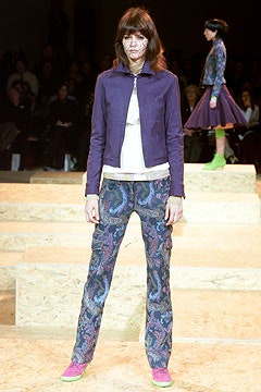 purple fitted jacket with multi pants