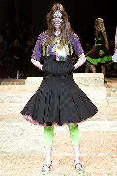 purple top black pleated skirt