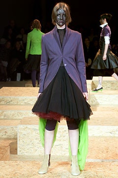 purple tailored blazer with black skirt