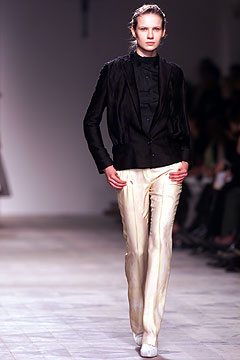 black silk fitted blazer and white tailored pants