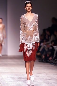 beige silk fitted top and red pencil skirt