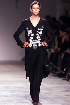 black fitted top with asymmetric skirt