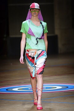 colorful top and pleated skirt