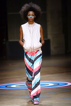 pink silk sleeveless top and multi flared skirt