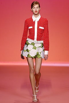 red polka-dot shirt and mini skirt