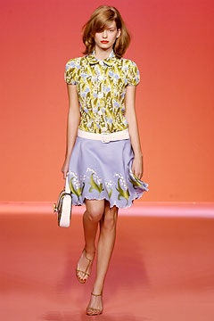 fitted yellow printed top with blue flared skirt