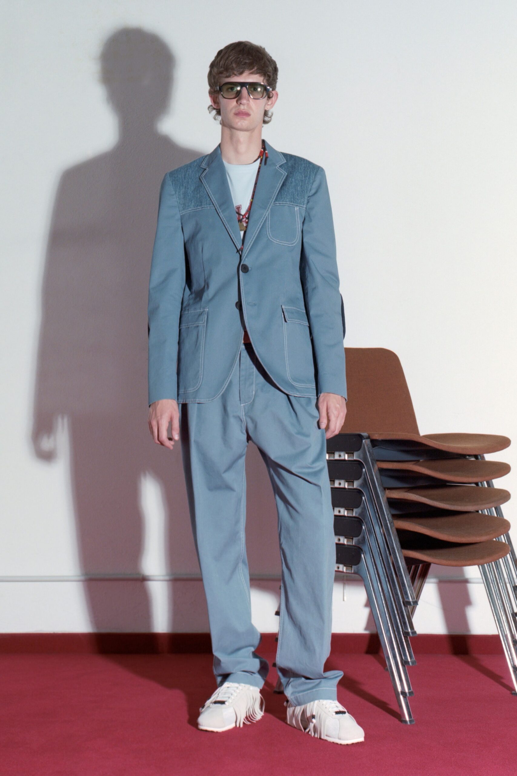 blue tailored suit with white t-shirt