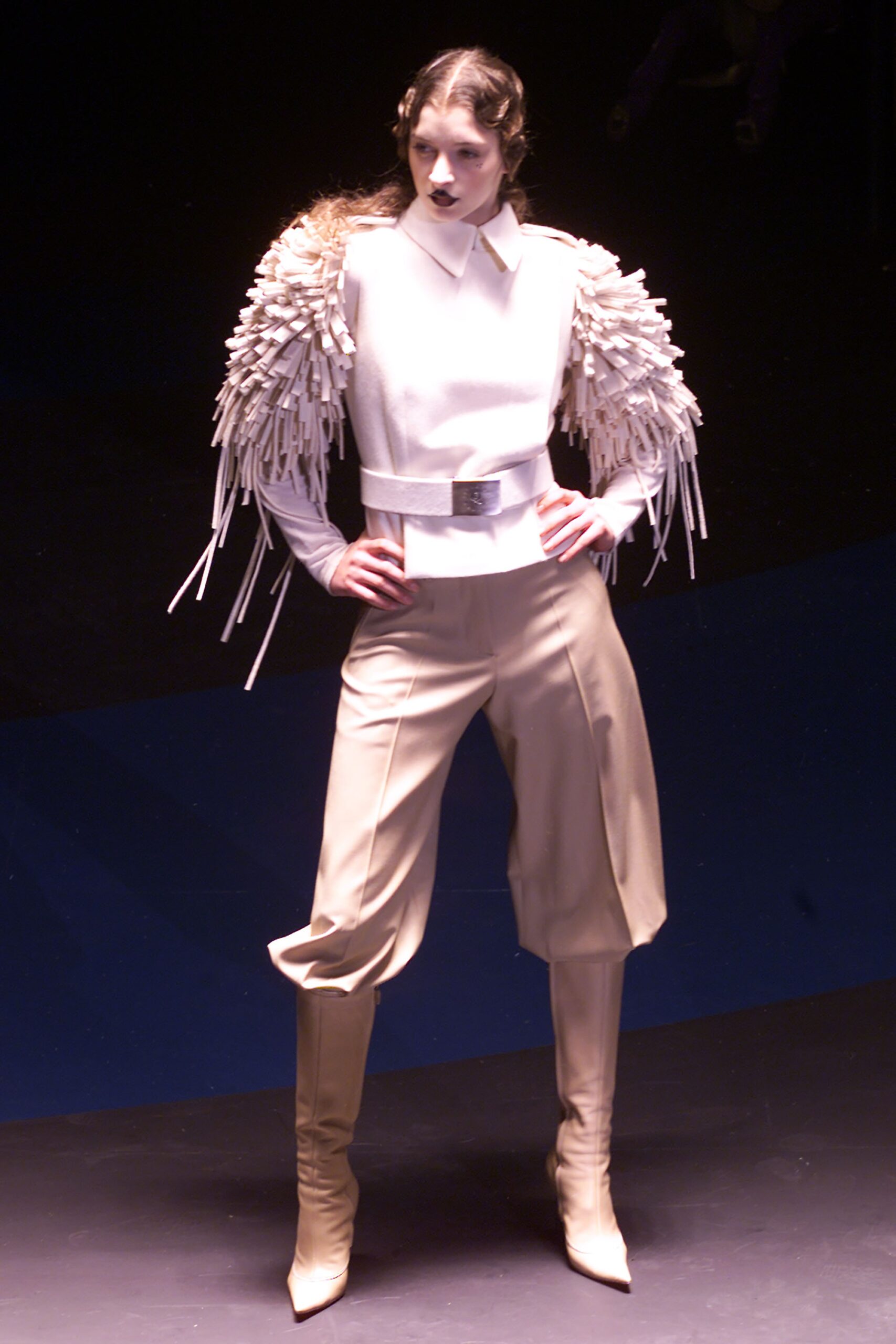 white fringed top beige pants