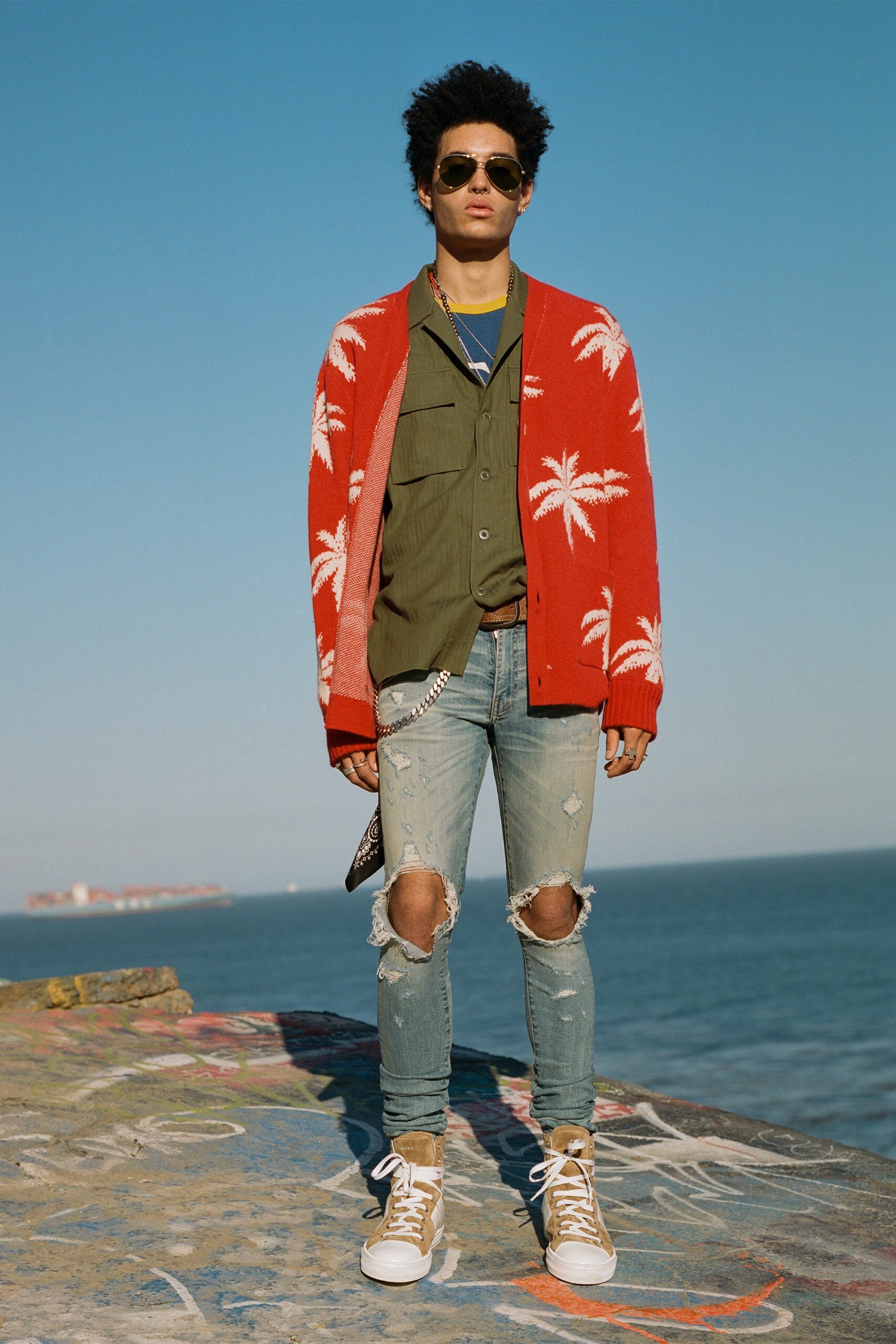 red palm print cardigan with green shirt