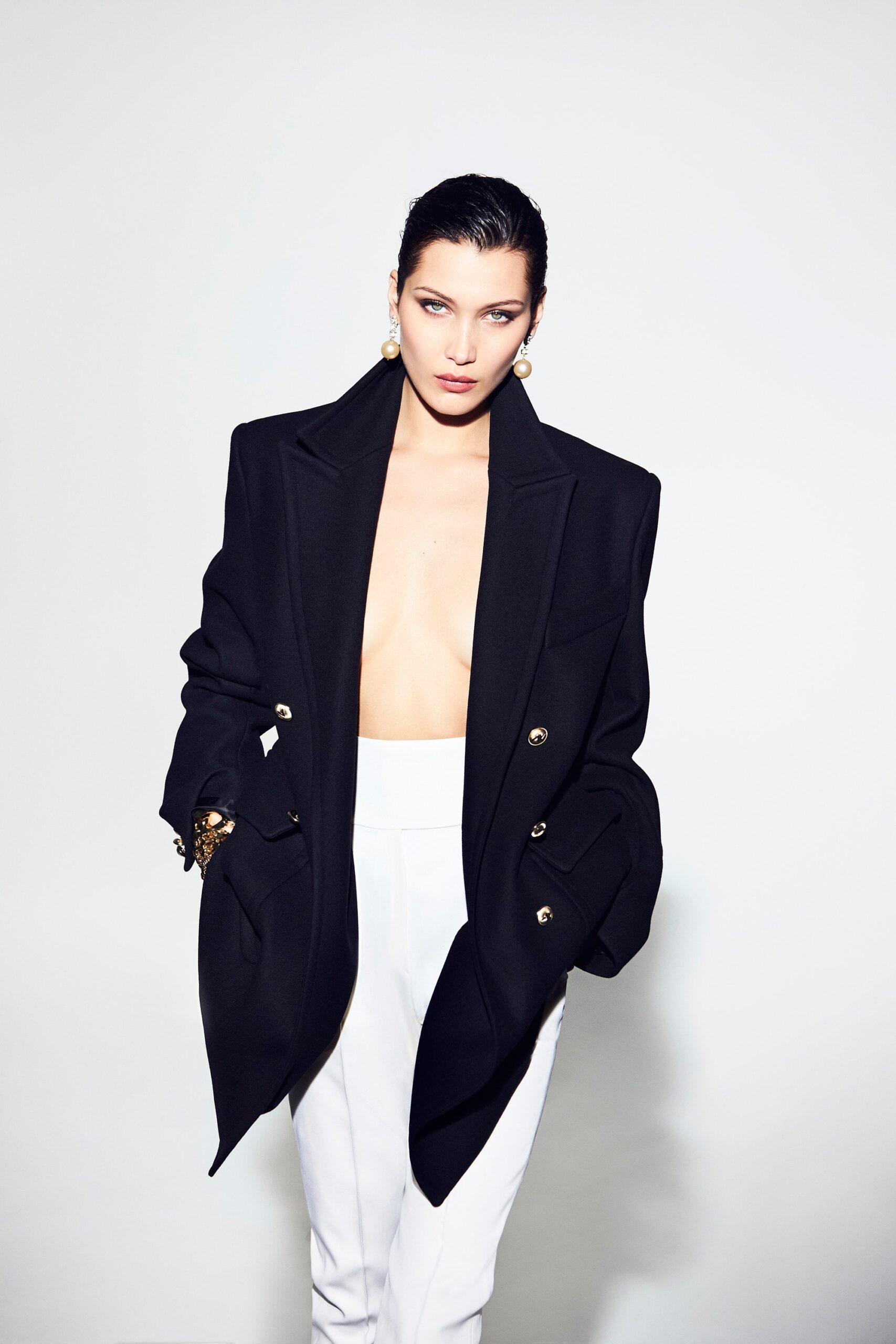 black oversized blazer and white tailored pants