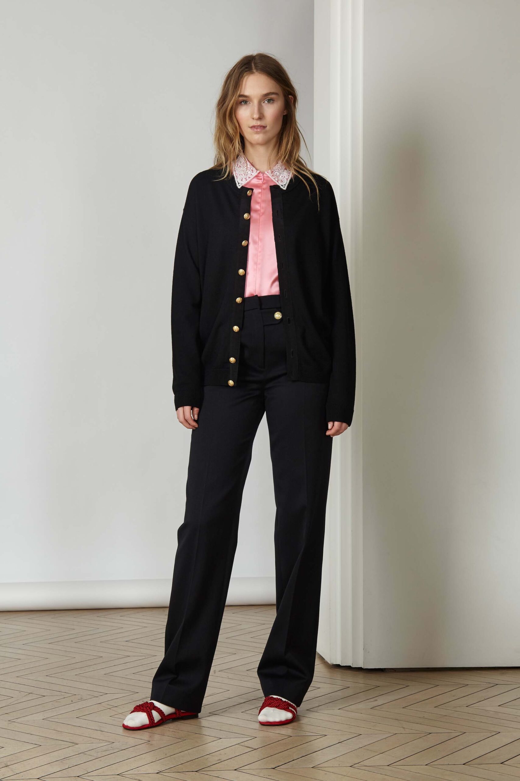 black cardigan pink shirt tailored pants