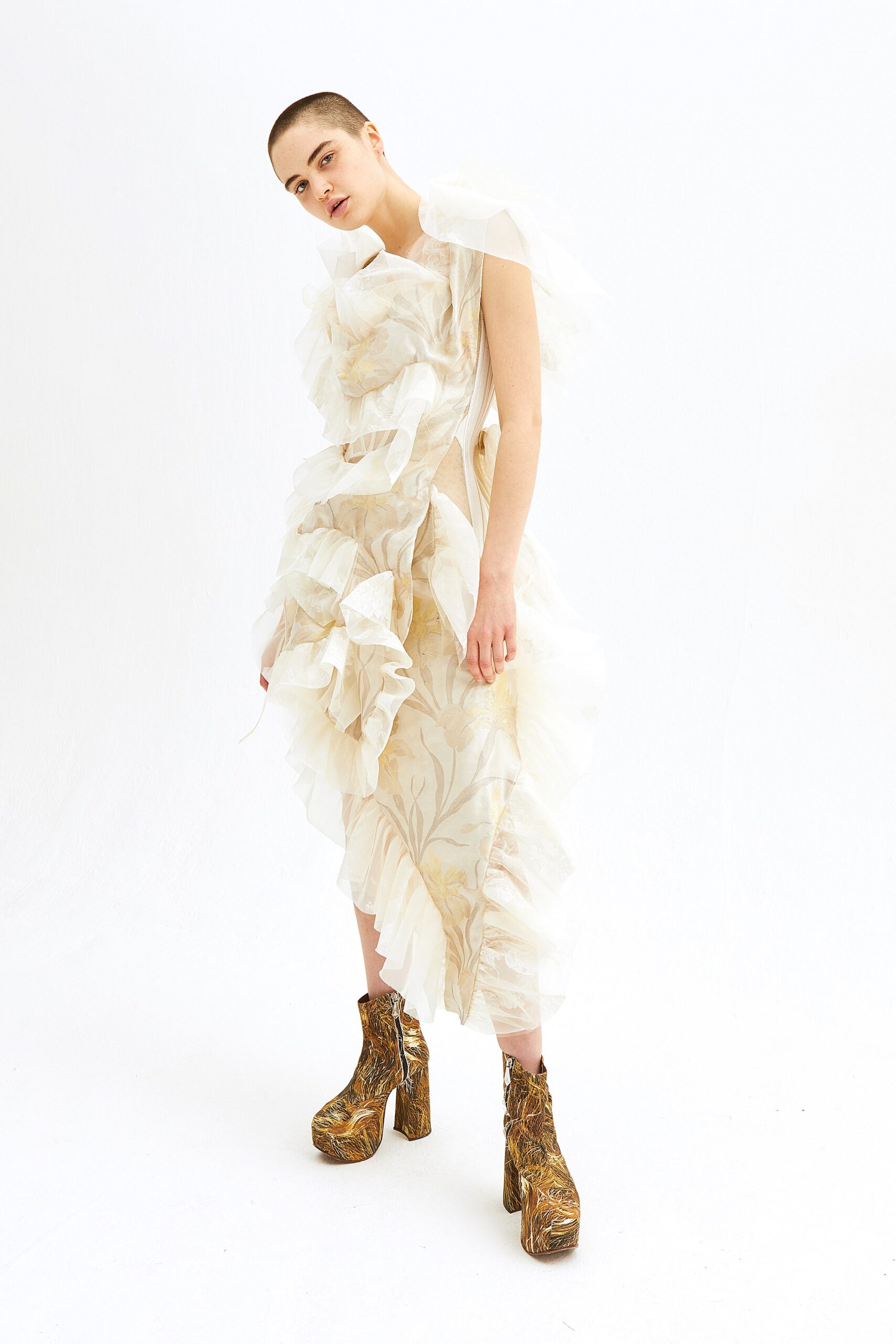white ruffled midi dress with gold boots