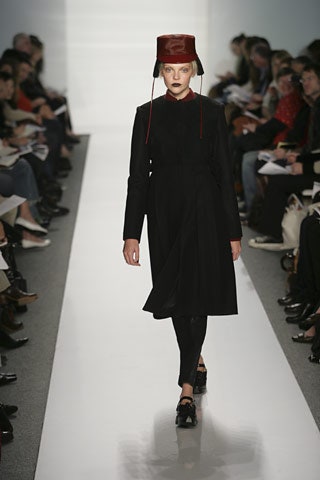 red structured embellished hat