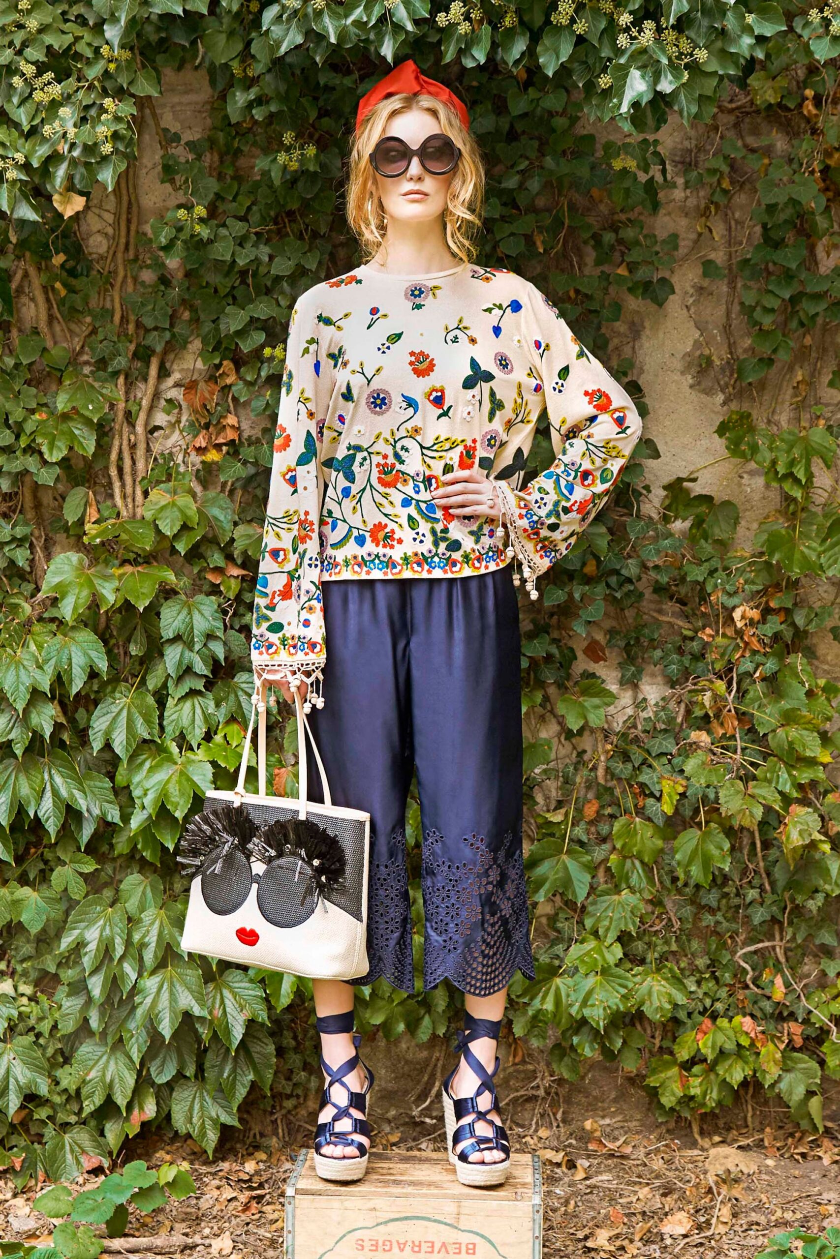 embroidered white blouse with navy pants