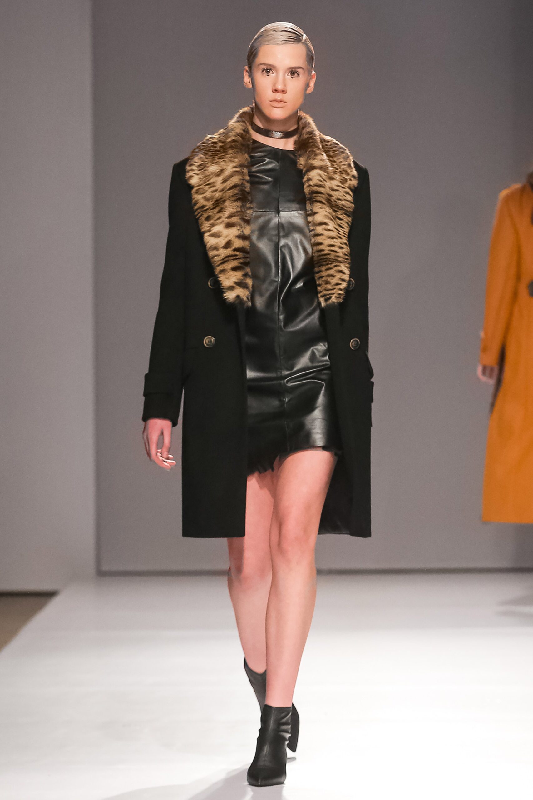 black wool coat with leather dress