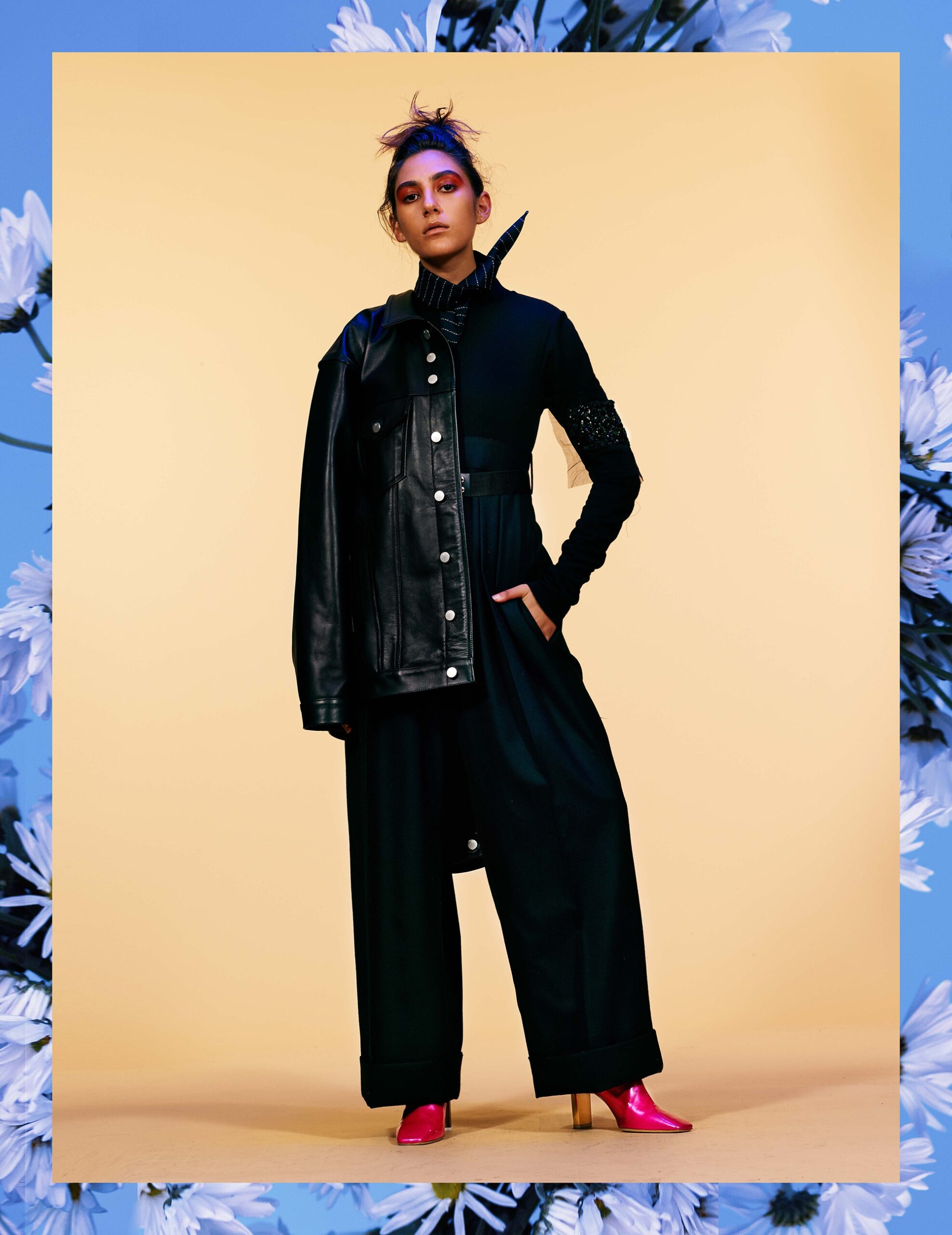 black leather jacket and relaxed pants