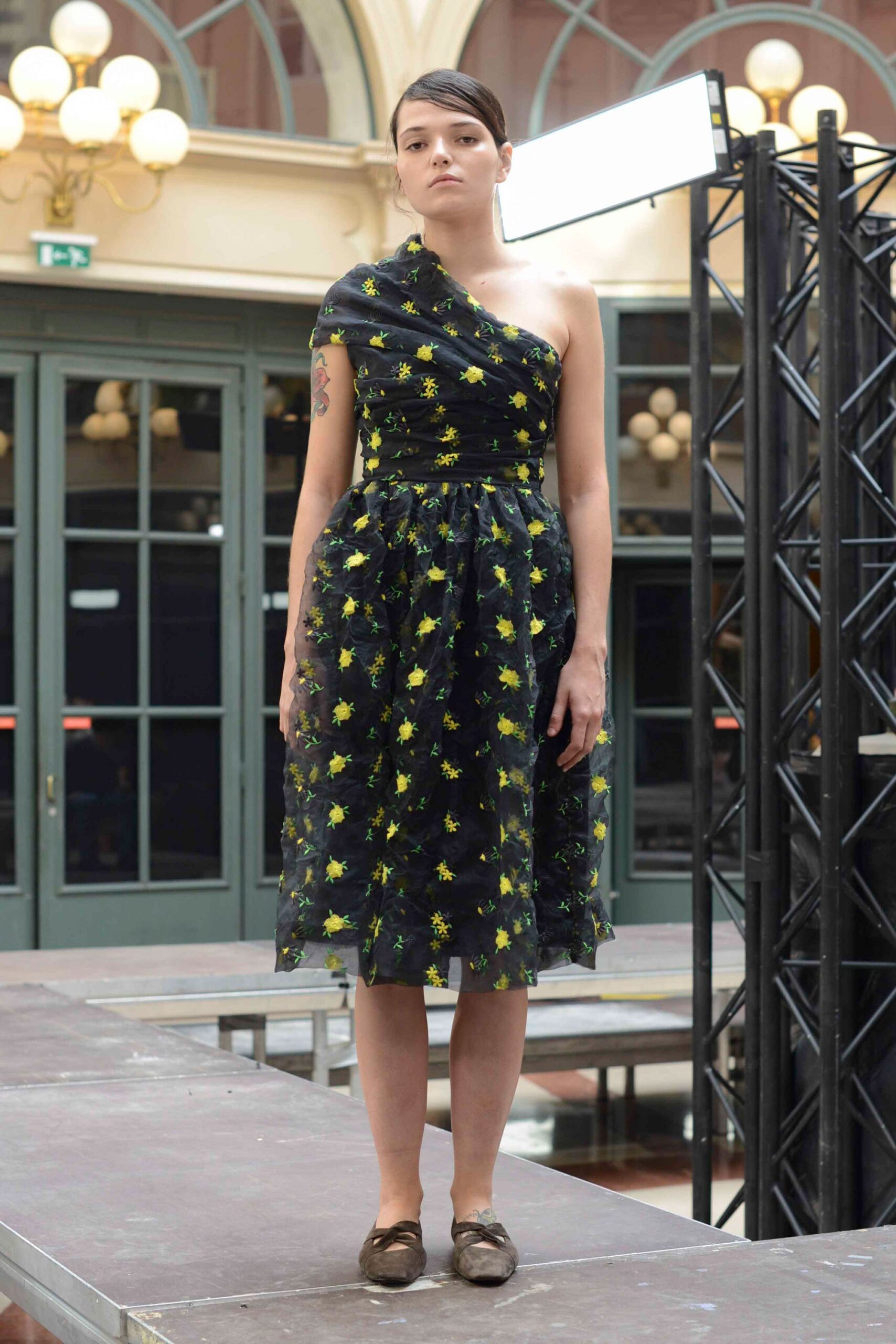 black embroidered off-shoulder dress
