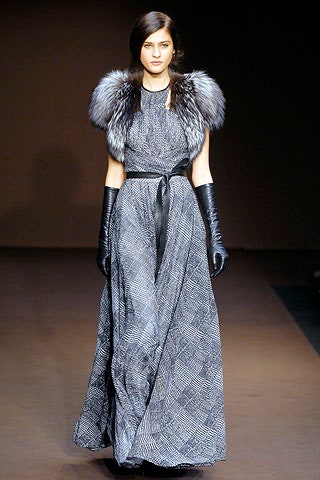 black silk sleeveless high-neck fitted layered belted gown