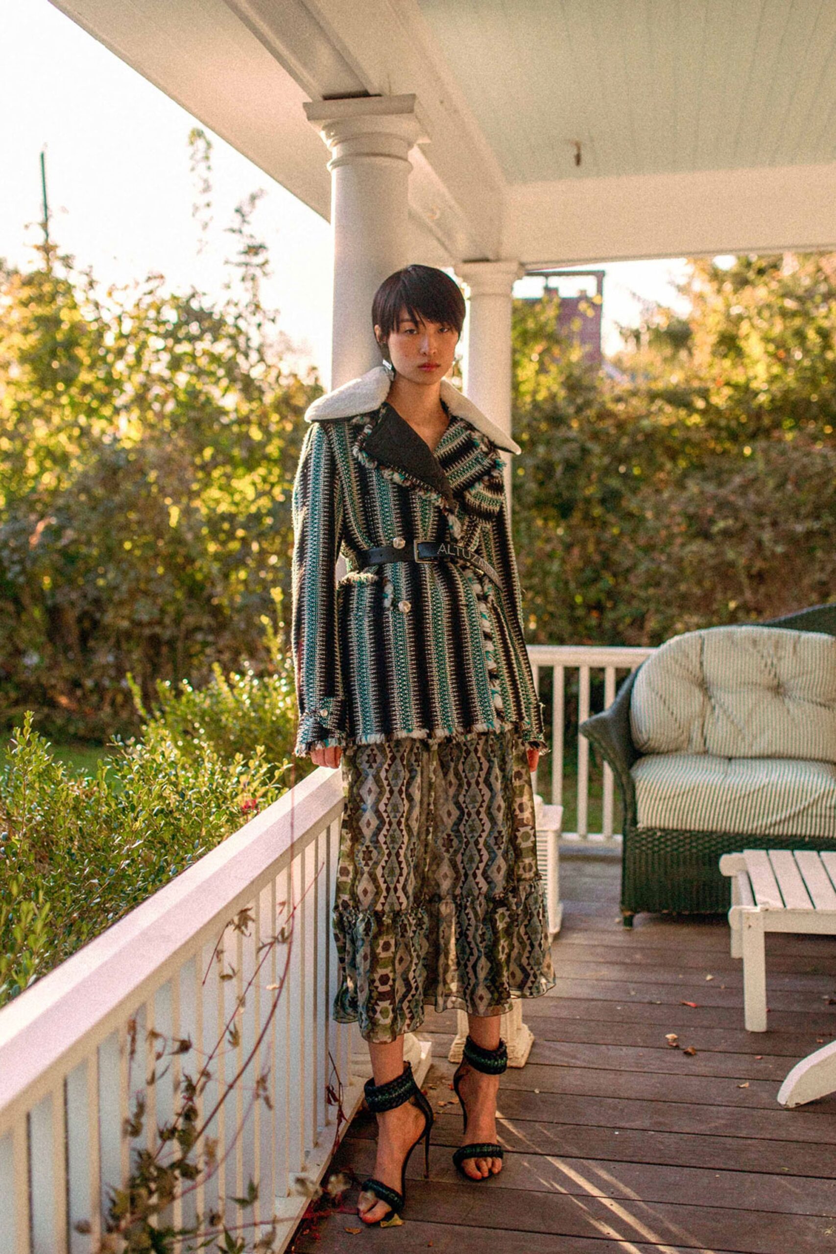 multi-colored tailored coat and tiered dress