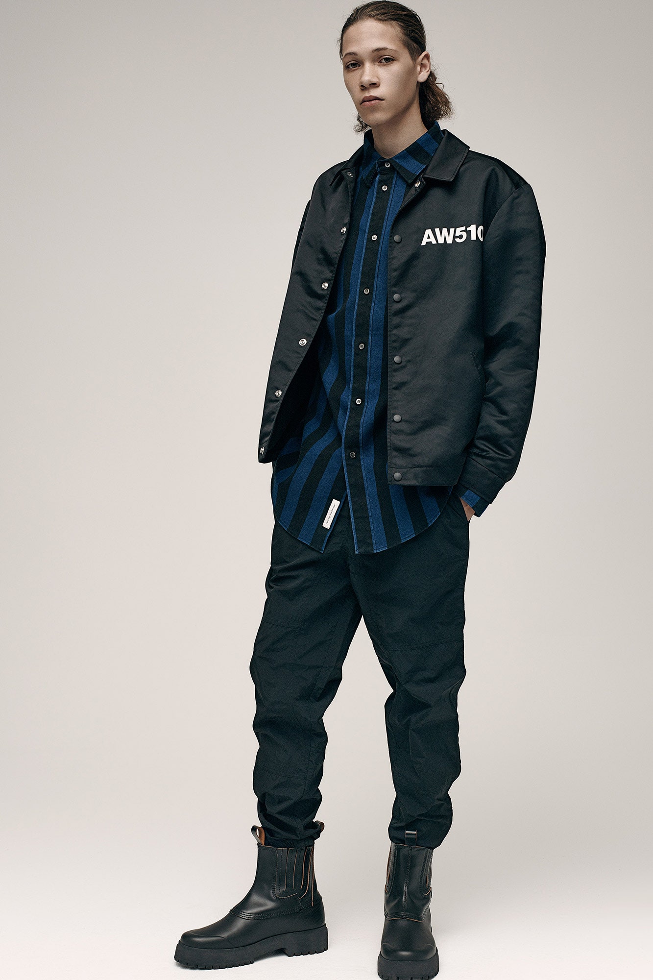 black relaxed jacket with blue shirt