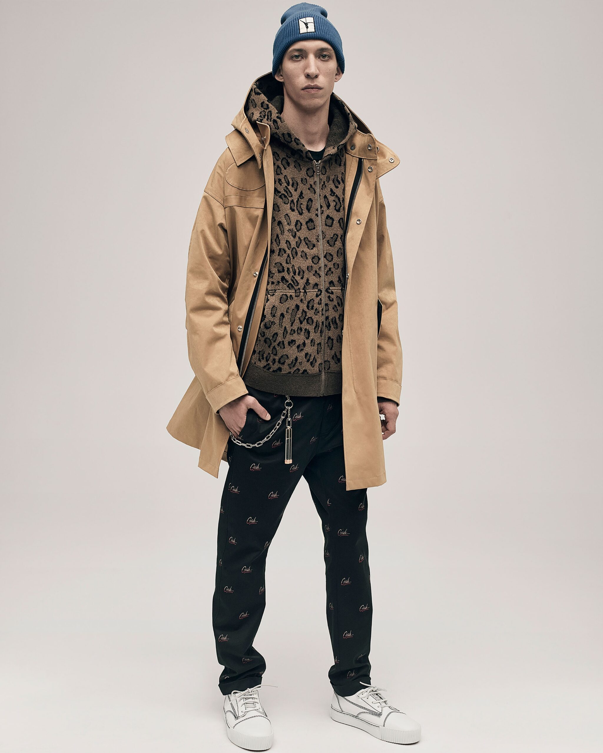 beige coat with animal-print hoodie