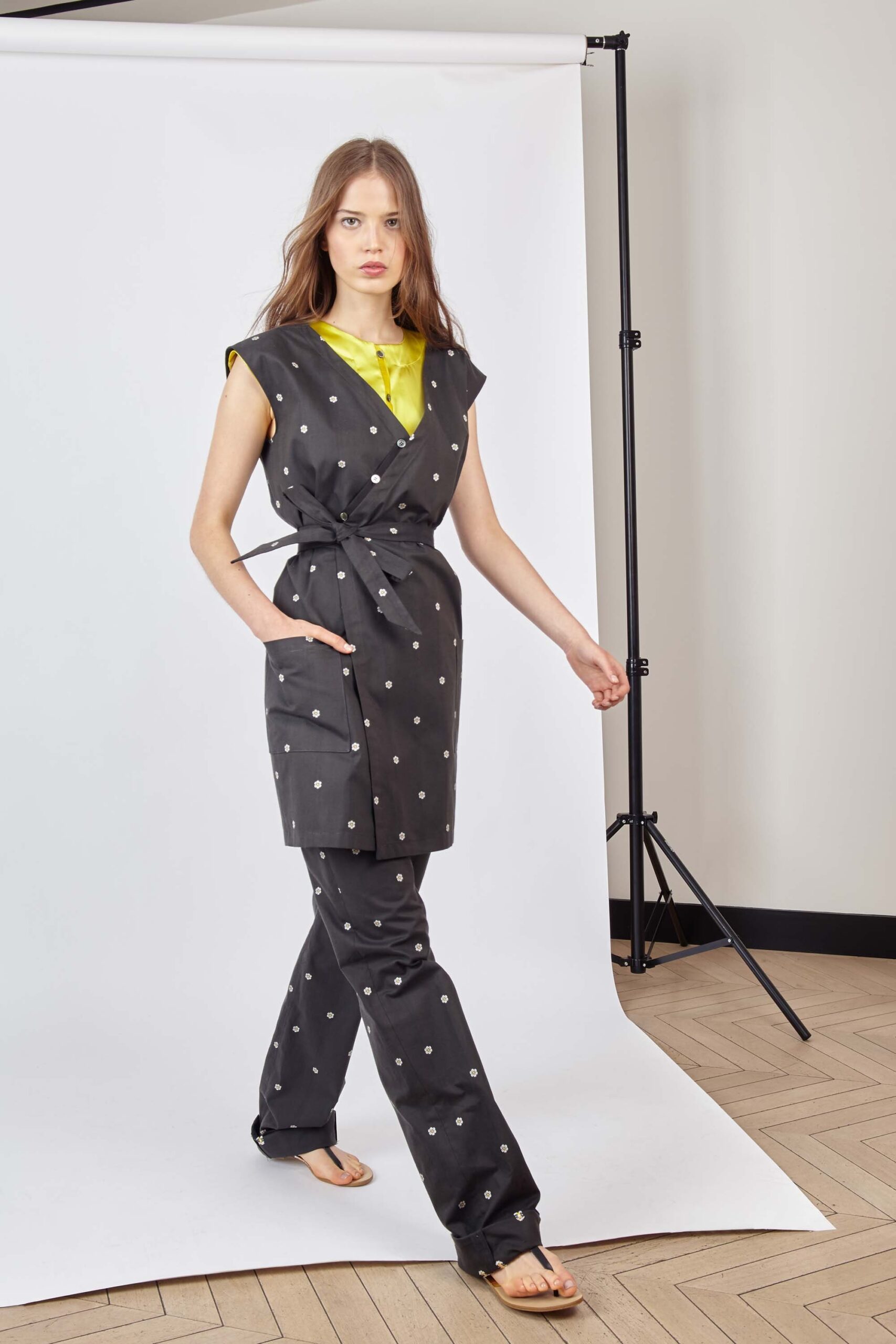 black polka-dot jacket with yellow top