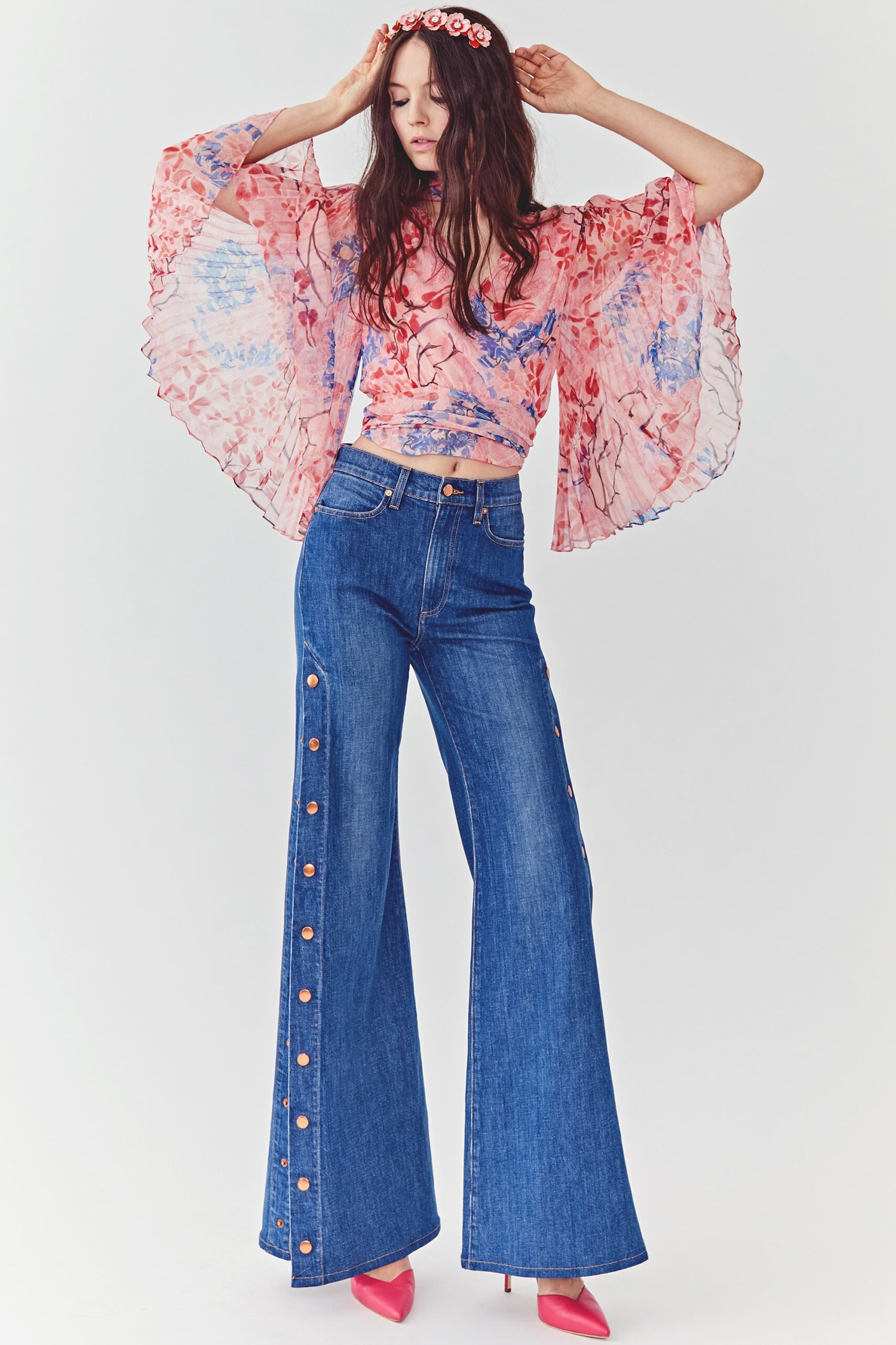 pink chiffon top with wide-leg jeans