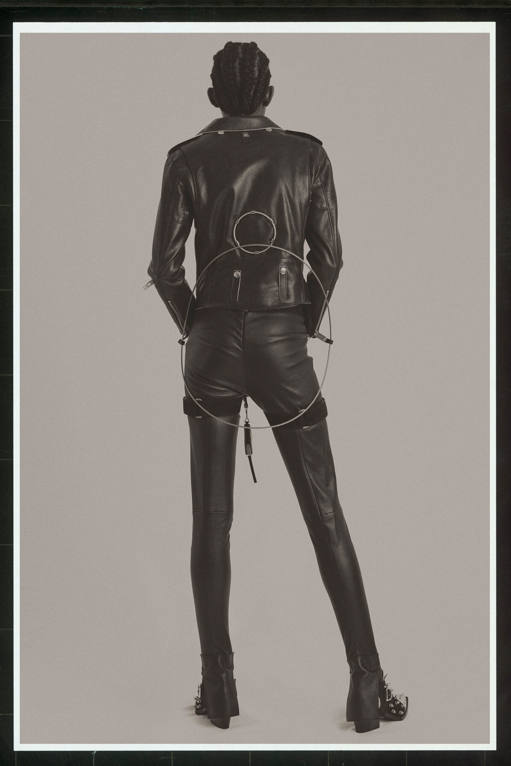black leather fitted jacket and pants