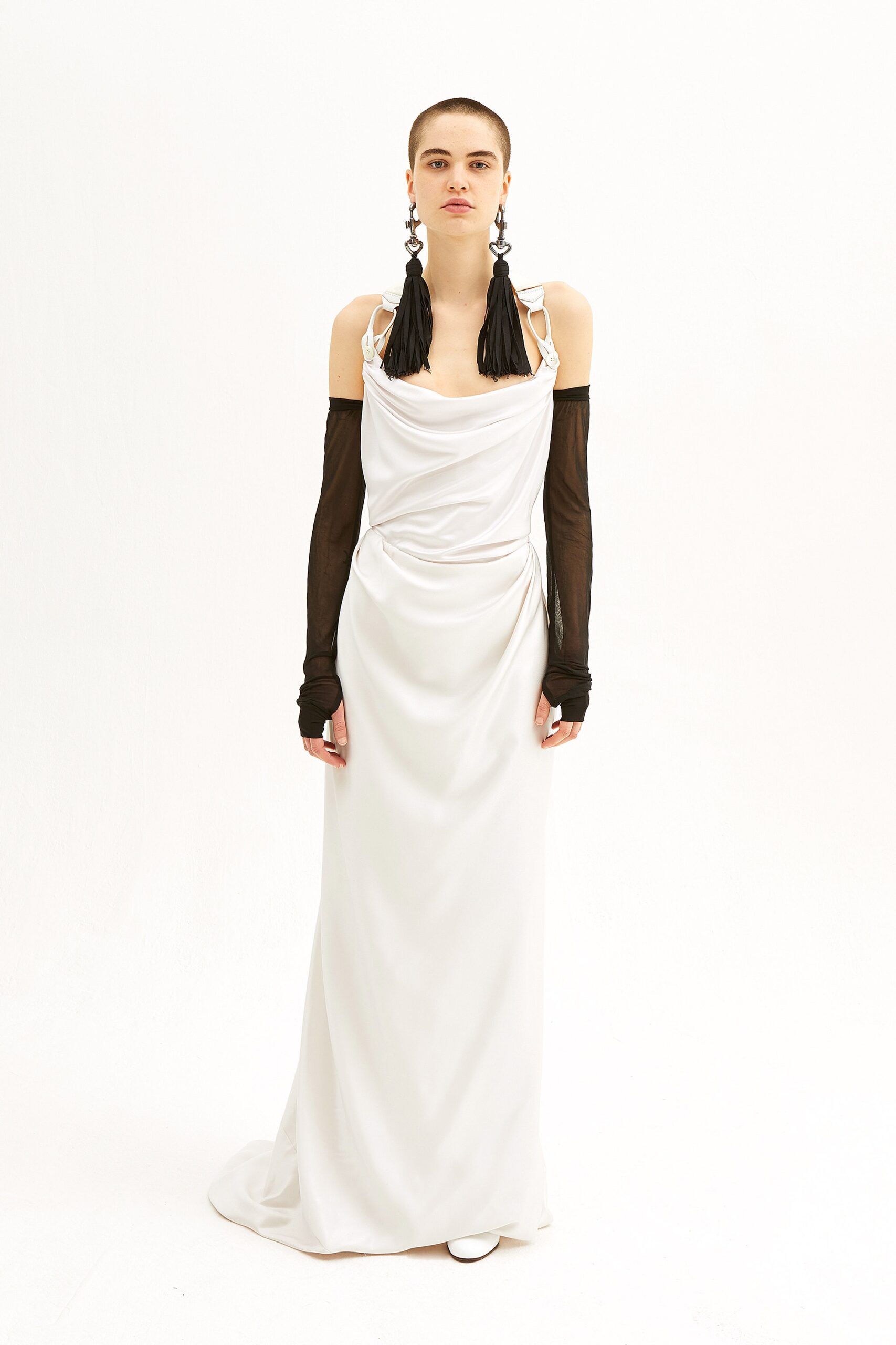 white silk fitted gown with black gloves