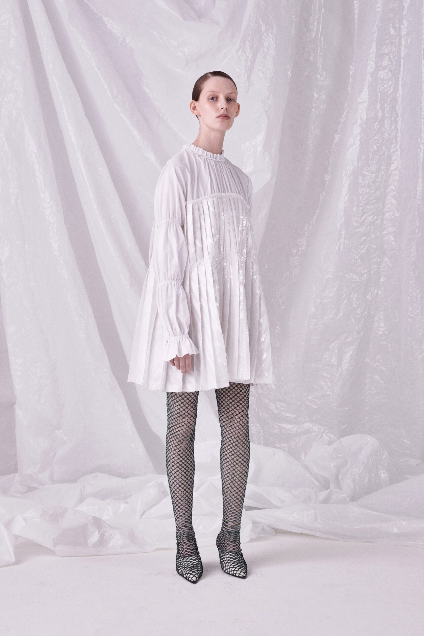 white pleated mini dress