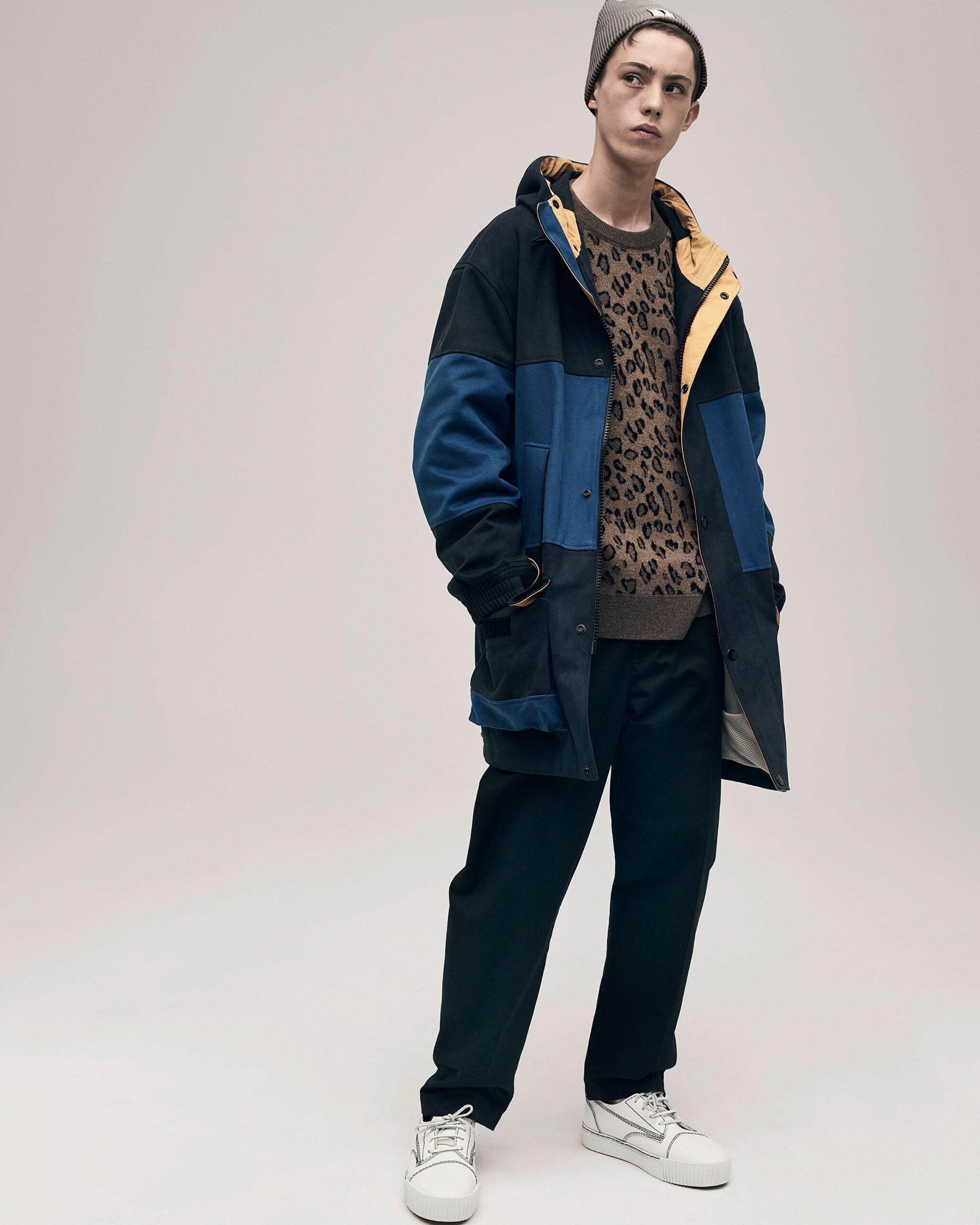 color-blocked coat with animal-print sweater